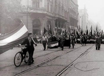 black and white photo of demonstrators on the streets of Budapest in 1956