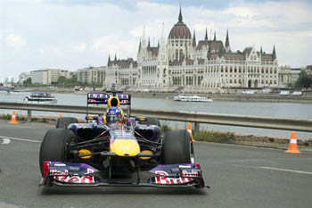 an F1 race car of the Red Bull team on the Danube bank in Buda