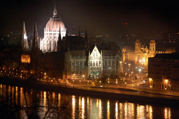 the Parliament at the Danube bank illuminated on a winter night