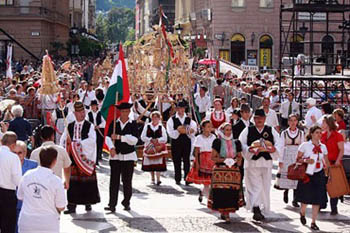 people in folk costumes on the Harvest Procession