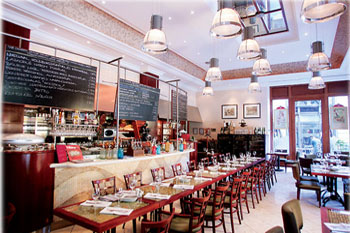 the interior of Bock bistro with black chalk boards onthe wall