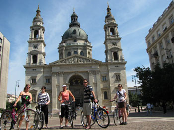 people on a bike tour in front of the Basilica in Pest