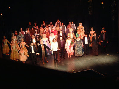 a performance with lots of people on stage in a Budapest Theatre