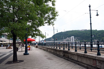 The Danube promenade with the white Erzsebet bridge in the background
