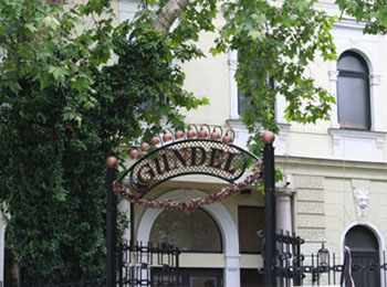 the wrought iron entrance gate of Gundel