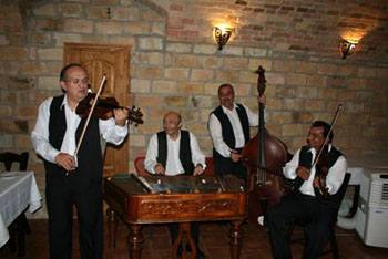 a gypsy band is playing in a restaurant