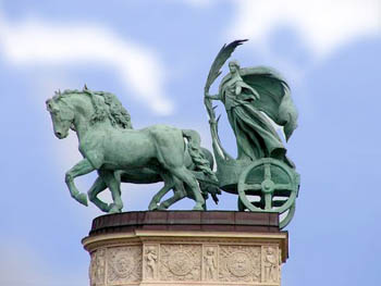 the symbol of Peace: a woman on a horse-drawn carriage with a branch in her right hand