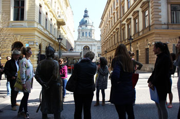 at the bronze policeman statue in Zrinyi Street on a Lucky 13 tour