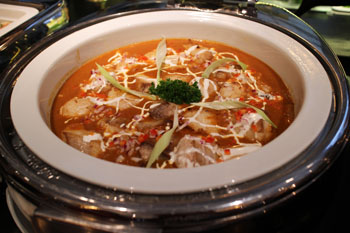 a bowl of catfish paprikash