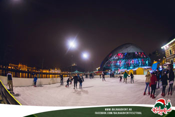 ice skaters at night at the Whale Advent festival