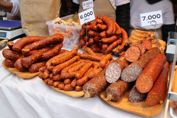 rows of paprika sausages and salamis