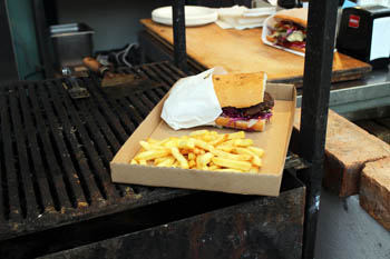 burger with fries on a cardboard tray