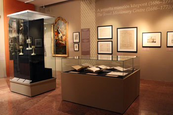 glass display cabinets in an exhibition hall in the History Museum