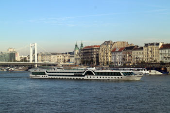 View of Elizabeth Bridge and a boat on the Danube