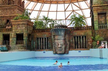 a pool in front of the Maya temple in Aquaworld