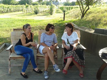 Drinking wine in a cellar