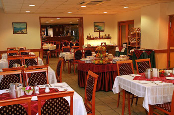 a couple of set tables in the Hotel's restaurant