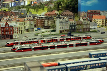 two red model trains