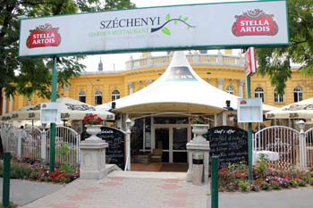 entrance to the restaurant, the yellow building of the Szecenyi bath in the background