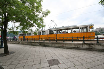 a yellow tram car