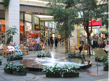 a fountain inside West End City Centre 