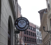 the round name plate of the restaurant