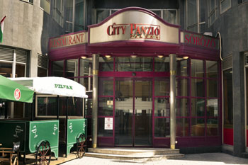 the red and silver entrance of the hotel