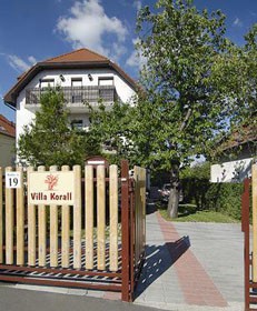 the courtyard and gate of Villa Korall Pension