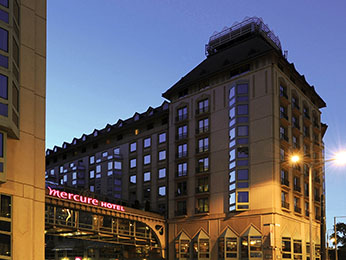 street view of Mercure Korona Hotel at dusk