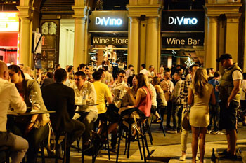 DiVino's terrace packed with people at night