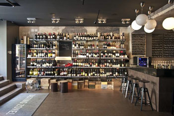 shelves full of wines in Drop Shop bar