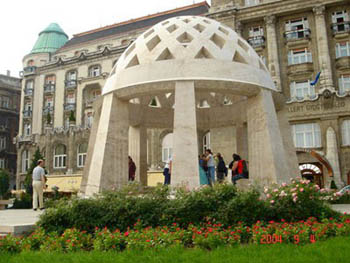 the off white marble drinking hall on Gellert Sqr.