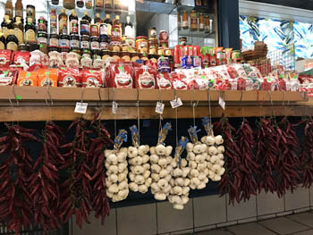paprika and garlic strings, paprika and other spices at a stall