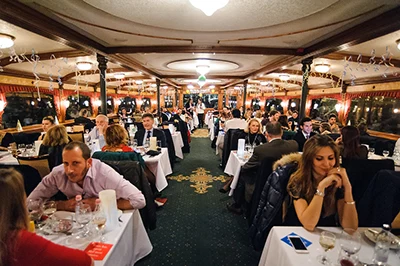people on the Europa ship having dinner,