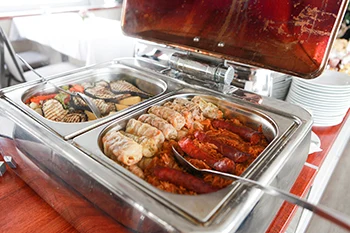 stuffed cabbage in a stainless steel serving container on budapest cruise with lunch