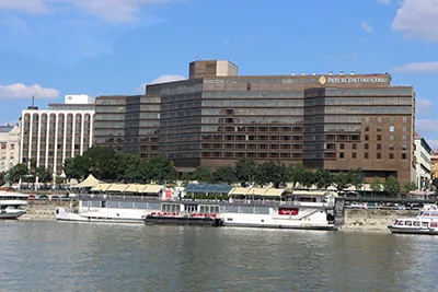 the front facade of Intercontinental Budapest, and the Marriott Hotel as seen from Buda