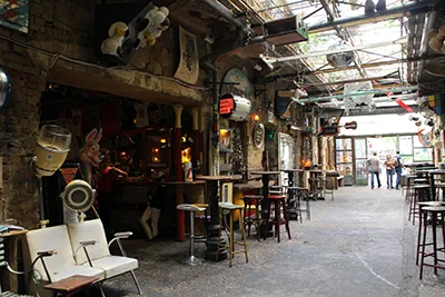 the mismatched furnishing and decor in Szimpla cafe Budapest during the day