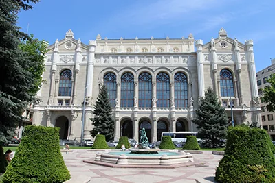 front view of the Vigadó Hall in Pest on a clear summer day