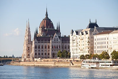 The Parliament photographed form a cruise boat on a summer afternoon