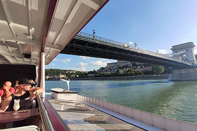 passing under the Chain Bridge with the Nimród boat on the cruise with pizza or lángos