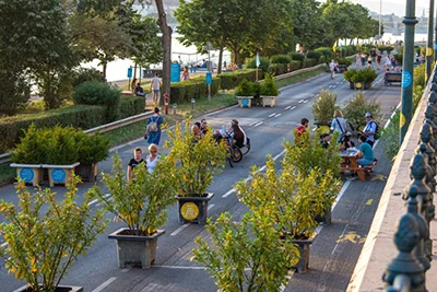 RAKPART 2023 - pedestrians, bikers take over the Pest riverbank on weeknds in summer. August in Budapest