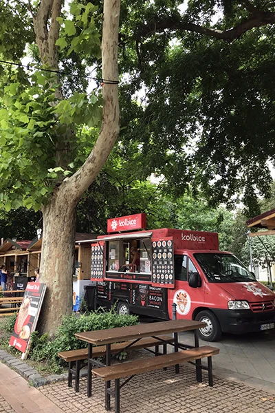 a red food truck at the Beer festival in Liberty Square
