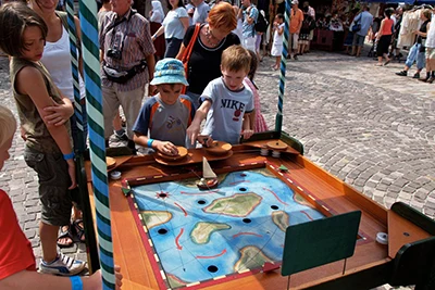 children playing folk games at the festival