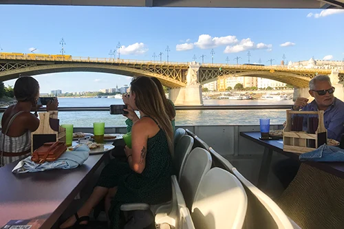 people on the Pizza and Beer cruise boat at Margaret bridge