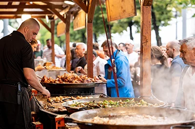 food vendors offering local dishes to visitors of the Hungarian Flavours festival