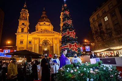 lighting the candle on the Advent wreath in St. Stephen's Sqr, at the Basilica of Budapest