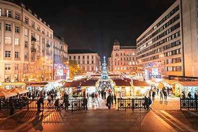 the Chirtsmas Market in front of St. Stephen's Basilica lit up at night - photo taken form the steps of the Basilica