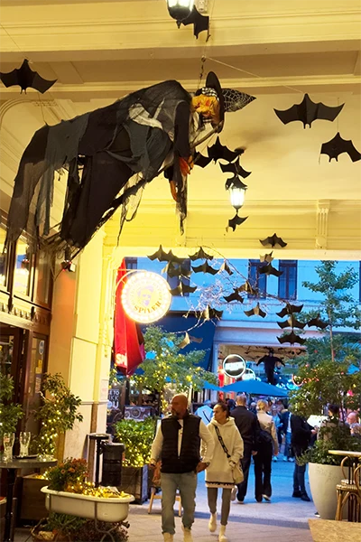 bats and a life-size witch hanging from the ceiling in Gozsdu Court