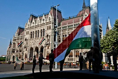 Raising the National Flag in front of the Parliament