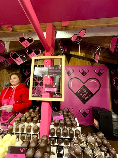 Chocolate bonbons at a pink coloured booth